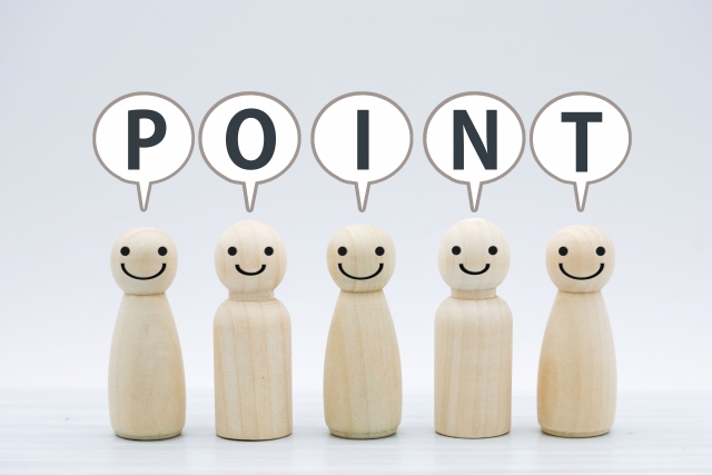 POINTの文字と木の人形の画像
